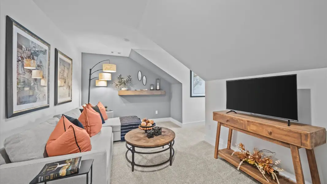 Top-notch design defines this loft with carpet floors and an open, airy layout Top-notch design defines this loft with carpet floors and an open, airy layout