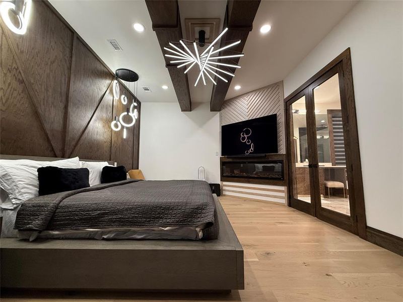 Bedroom featuring light wood-style flooring and recessed lighting