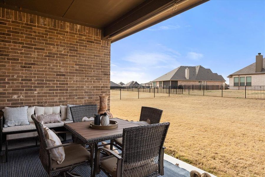 Exterior details and patio area of a home in Abe's Landing, Granbury (Image 3). Exterior details and patio area of a home in Abe's Landing, Granbury (Image 3).