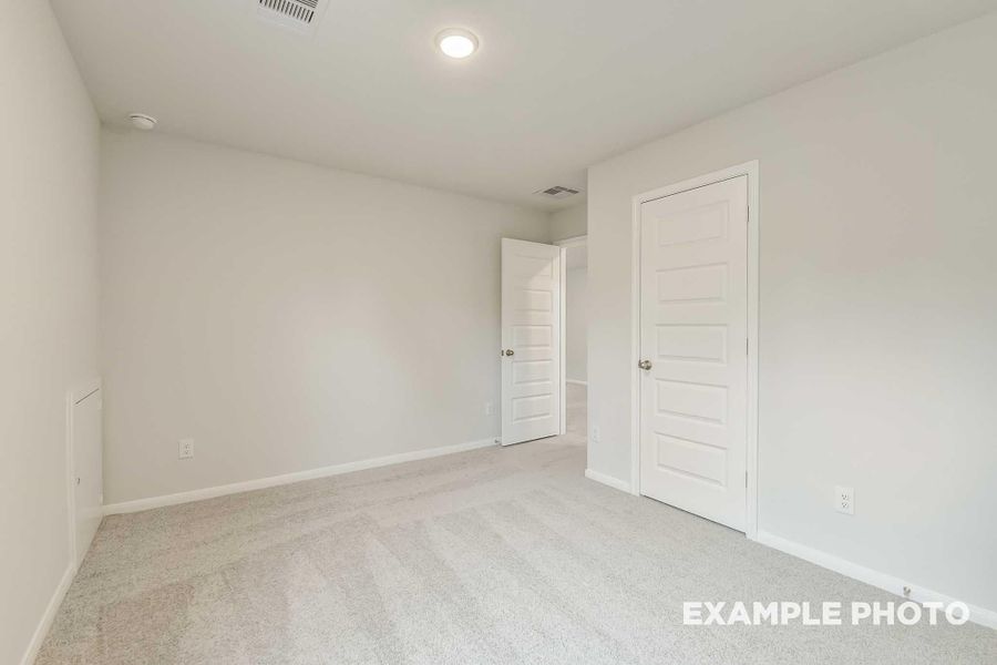 Spacious, unfurnished interior of a new home in Caney Creek Place, Conroe (Image 28).