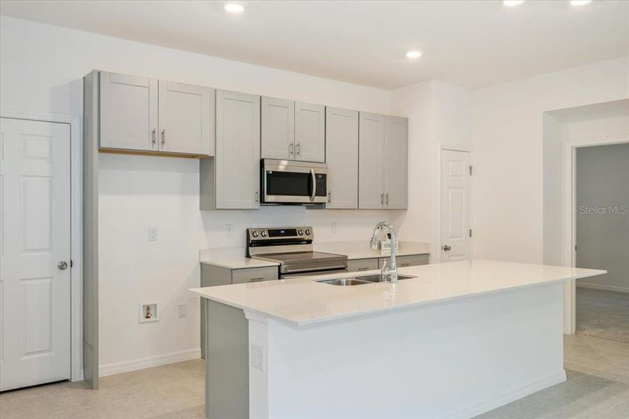 Furnished interior view inside a new home in Liberty Station, Orange City (Image 4).