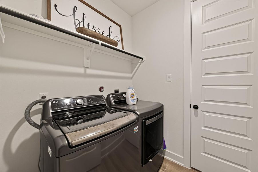 The utility room offers additional storage and convenient laundry space. The utility room offers additional storage and convenient laundry space.