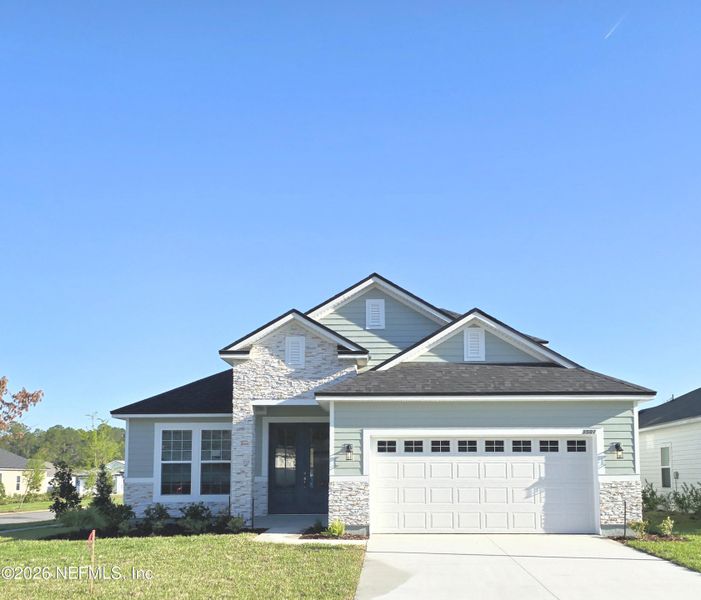 Front exterior of a new home in Hyland Trail, Green Cove Springs, FL, highlighting curb appeal (Image 26).