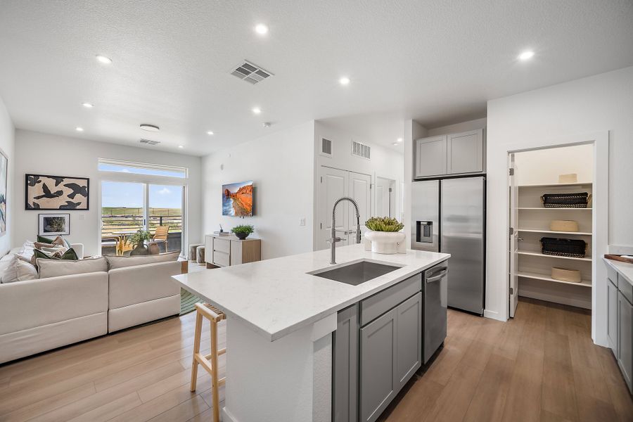 Furnished interior view inside a new home in Lyric at RidgeGate Condos, Lone Tree (Image 7).
