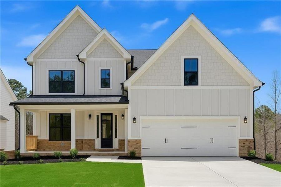 Front exterior of a new home in , Dallas, GA, highlighting curb appeal (Image 2). Front exterior of a new home in , Dallas, GA, highlighting curb appeal (Image 2).