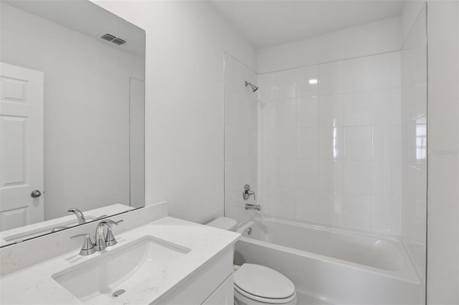 Furnished interior view inside a new home in Springs at Lake Alfred - Classic Series, Lake Alfred (Image 12).