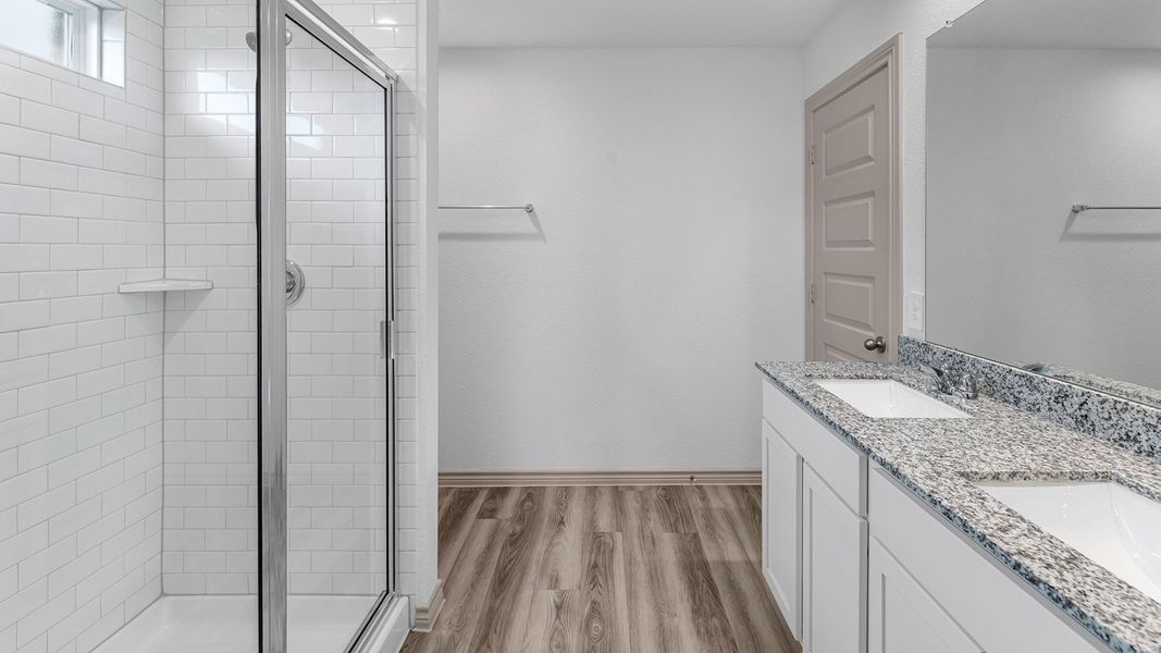 Furnished interior view inside a new home in Reserve at Mallard Lakes, Orange (Image 7).