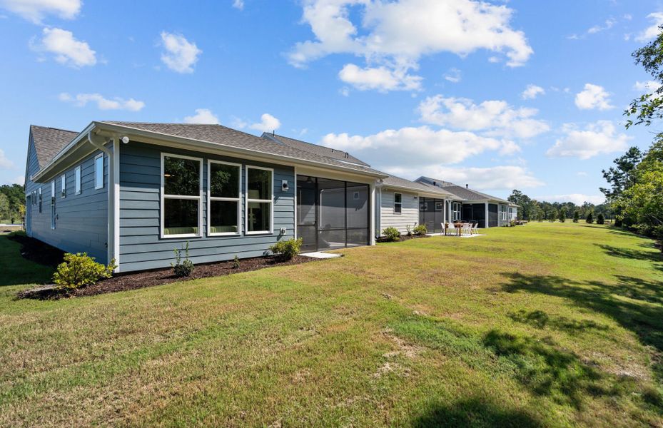 Exterior details and patio area of a home in Del Webb Wilmington at Mallory Creek, Leland (Image 2). Exterior details and patio area of a home in Del Webb Wilmington at Mallory Creek, Leland (Image 2).