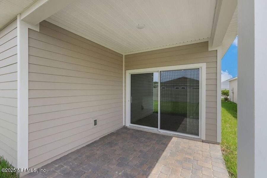 Exterior details and patio area of a home in Coopers Meadow, Jacksonville (Image 1).