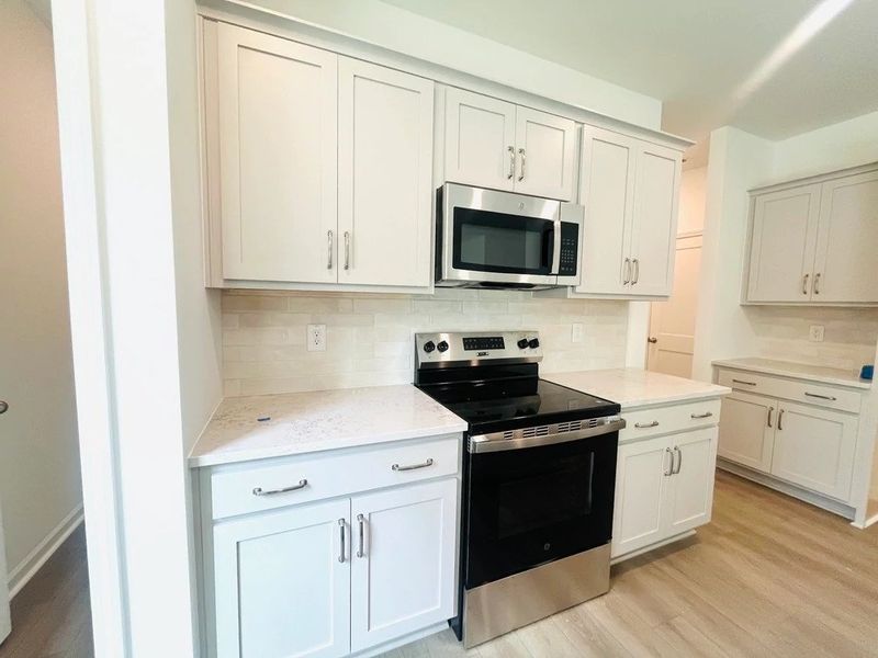 Furnished interior view inside a new home in Middleton Farms, Middlesex (Image 5).