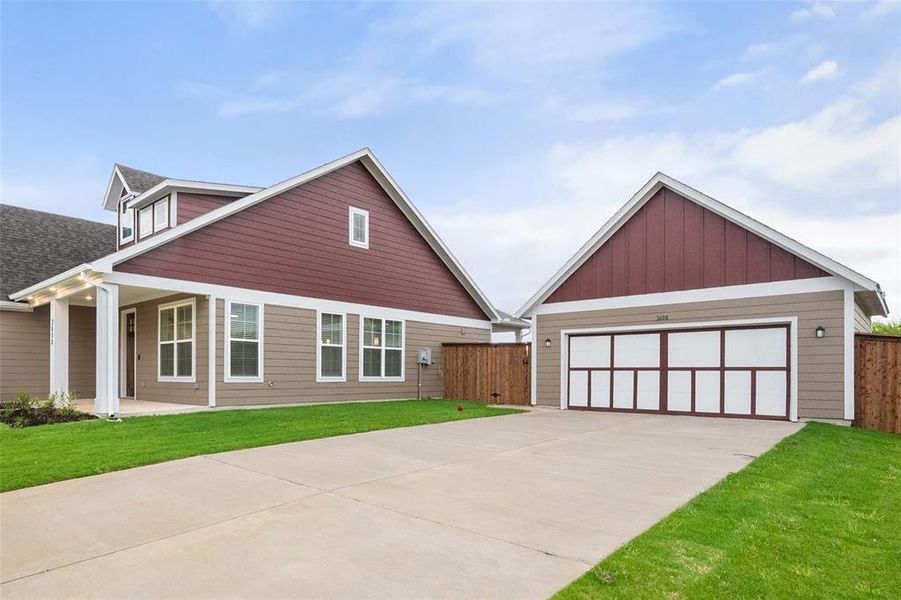 View of home with garage View of home with garage