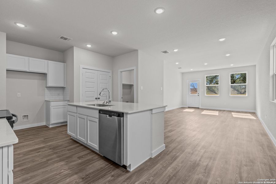 Furnished interior view inside a new home in Hacienda, San Antonio (Image 7).