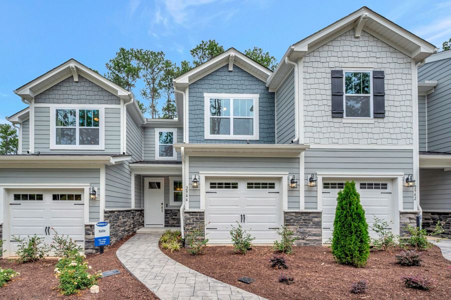 Representative exterior photo of a completed home built from the Hallie by Mattamy Homes in Ashmore Townes, Garner, NC (Image 2). Representative exterior photo of a completed home built from the Hallie by Mattamy Homes in Ashmore Townes, Garner, NC (Image 2).
