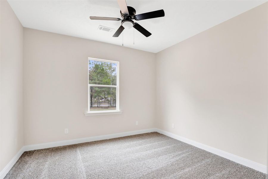 Bedroom #2 located downstairs.