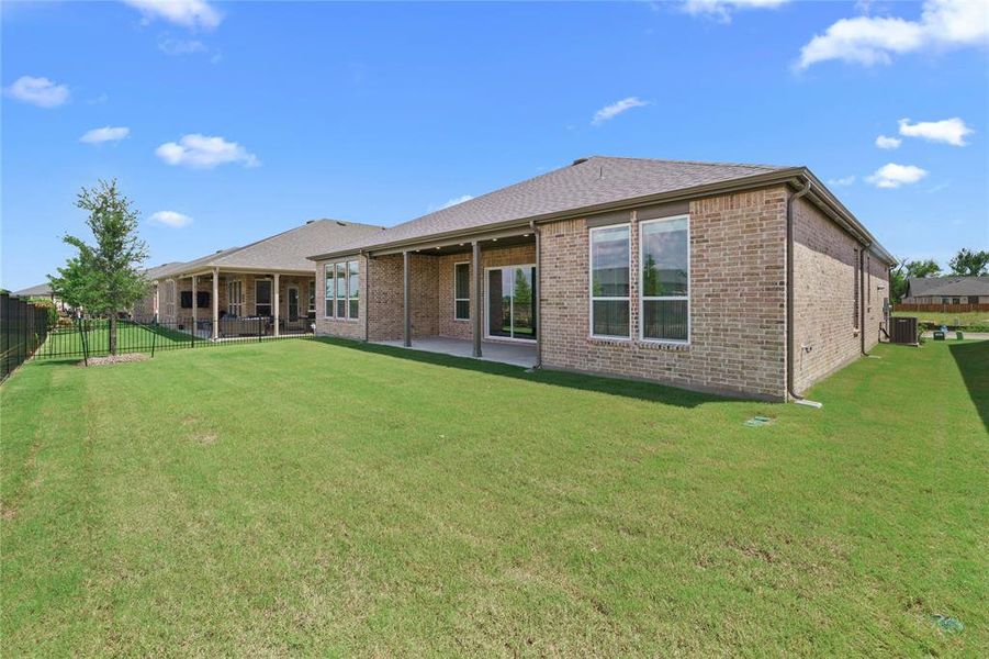Exterior details and patio area of a home in , McKinney (Image 26).