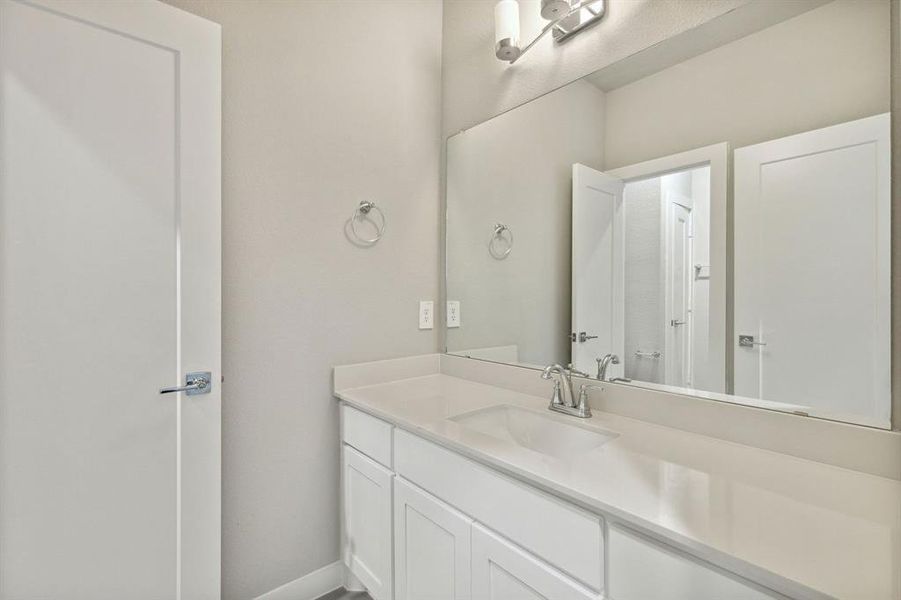 Bathroom in the Henley home plan by Trophy Signature Homes – REPRESENTATIVE PHOTO Bathroom in the Henley home plan by Trophy Signature Homes – REPRESENTATIVE PHOTO