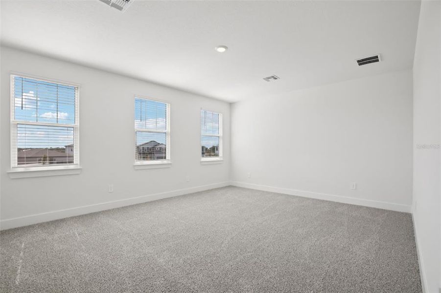 Spacious, unfurnished interior of a new home in Magnolia Bay - Reserve Series, Nokomis (Image 25).