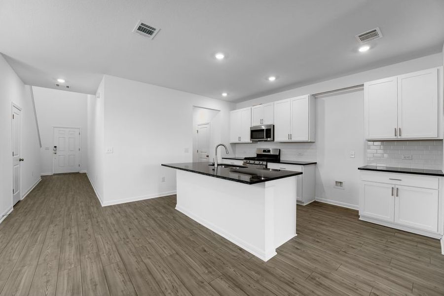 Furnished interior view inside a new home in Longview, Del Valle (Image 7).