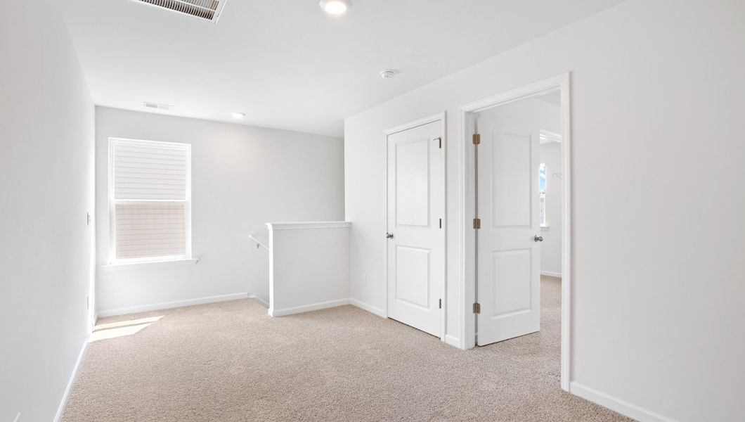 Spacious, unfurnished interior of a new home in Harrier Point, Woodruff (Image 17).