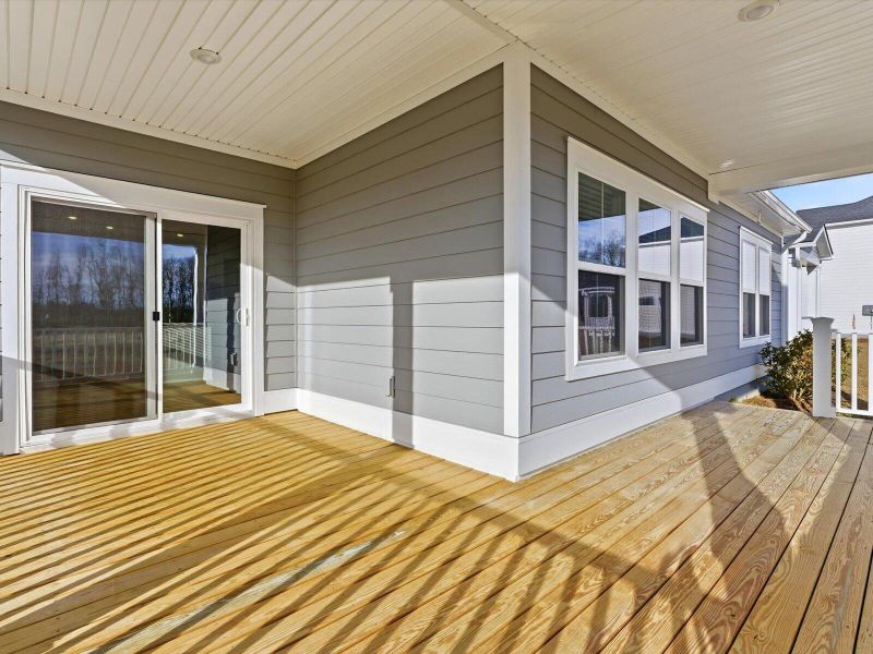 Exterior details and patio area of a home in The Coves at Lakes of Cane Bay, Summerville (Image 25).