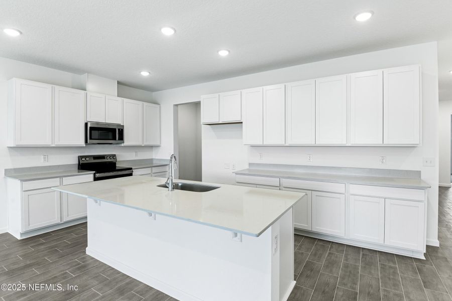 Furnished interior view inside a new home in Seasons at Grandview Gardens, Deland (Image 6).