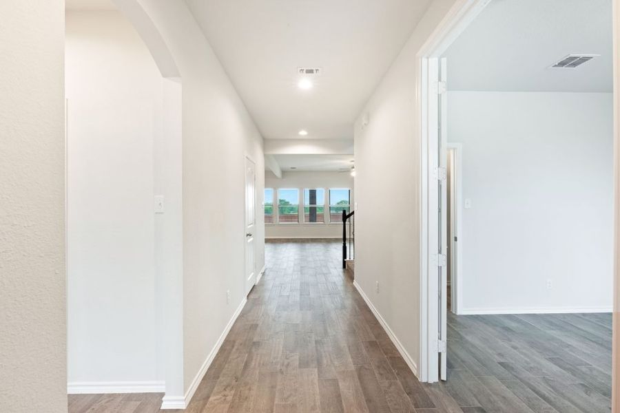 Representative exterior photo of a completed home built from the Radcliffe II by Impression Homes in Stone Eagle, Azle, TX (Image 8).