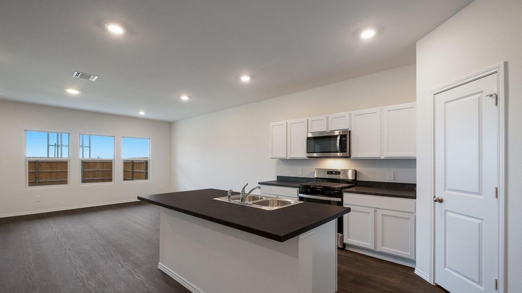 Furnished interior view inside a new home in Talavera, Kyle (Image 4). Furnished interior view inside a new home in Talavera, Kyle (Image 4).