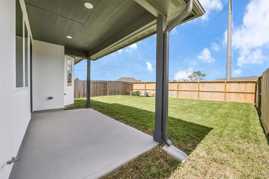Exterior details and patio area of a home in Sienna 40', Missouri City (Image 4). Exterior details and patio area of a home in Sienna 40', Missouri City (Image 4).
