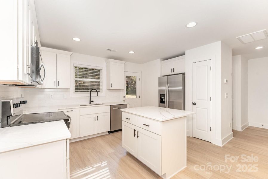 Furnished interior view inside a new home in , Statesville (Image 5).