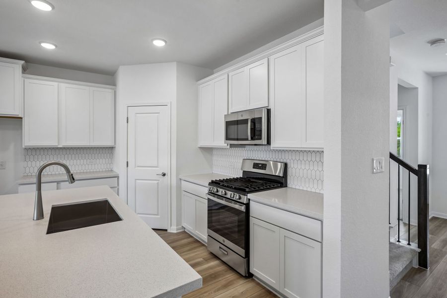 Furnished interior view inside a new home in Lisso, Pflugerville (Image 6).