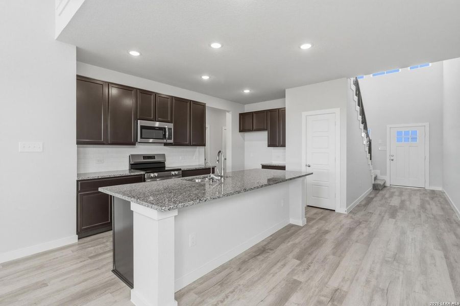 Furnished interior view inside a new home in Red Hawk Landing, San Antonio (Image 8).