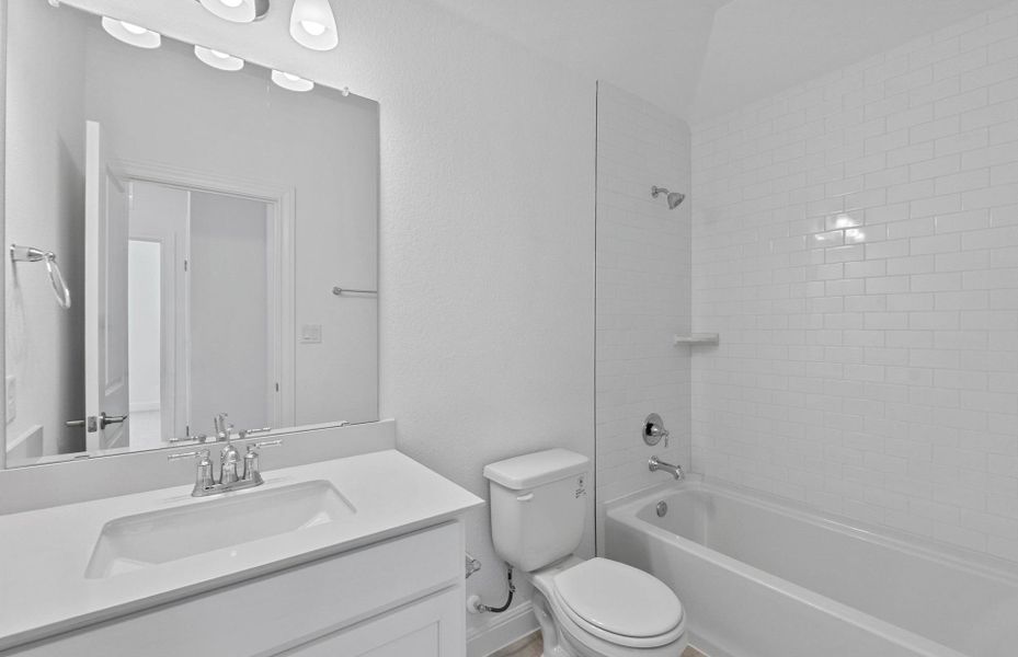 Furnished interior view inside a new home in Bluffview Reserve, Leander (Image 9).