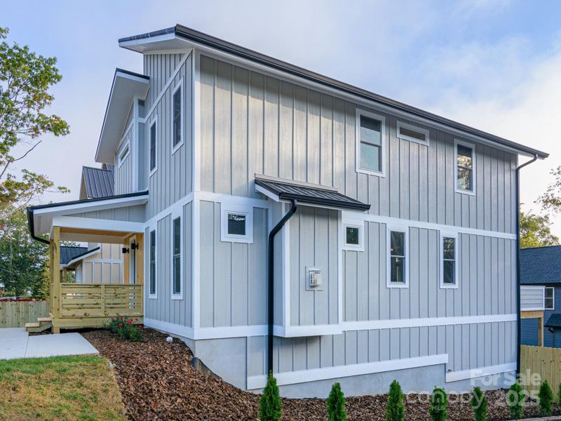 Front exterior of a new home in , Asheville, NC, highlighting curb appeal (Image 29).