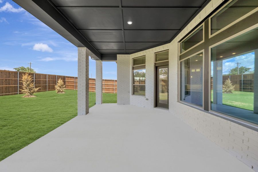 Exterior details and patio area of a home in Northshore at Lakewood Village - Garden Series, Lakewood Village (Image 20).