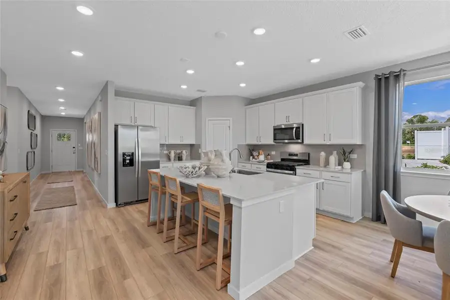 Furnished interior view inside a new home in The Magnolia Series at Reserve East, Flagler Beach (Image 7).
