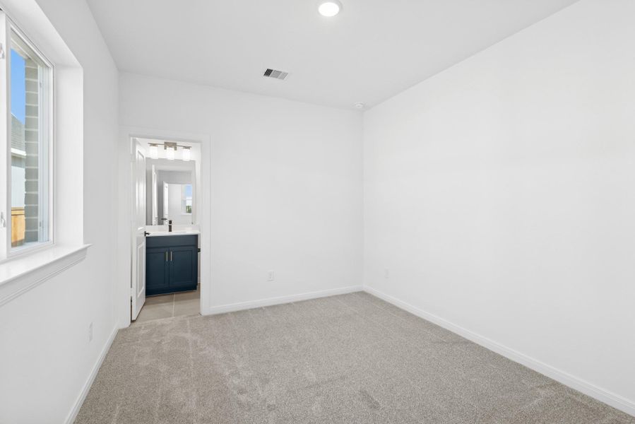 Spacious, unfurnished interior of a new home in The Grand Prairie 50’, Hockley (Image 22).