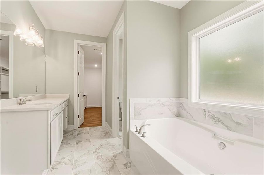 Furnished interior view inside a new home in , Carrollton (Image 13).