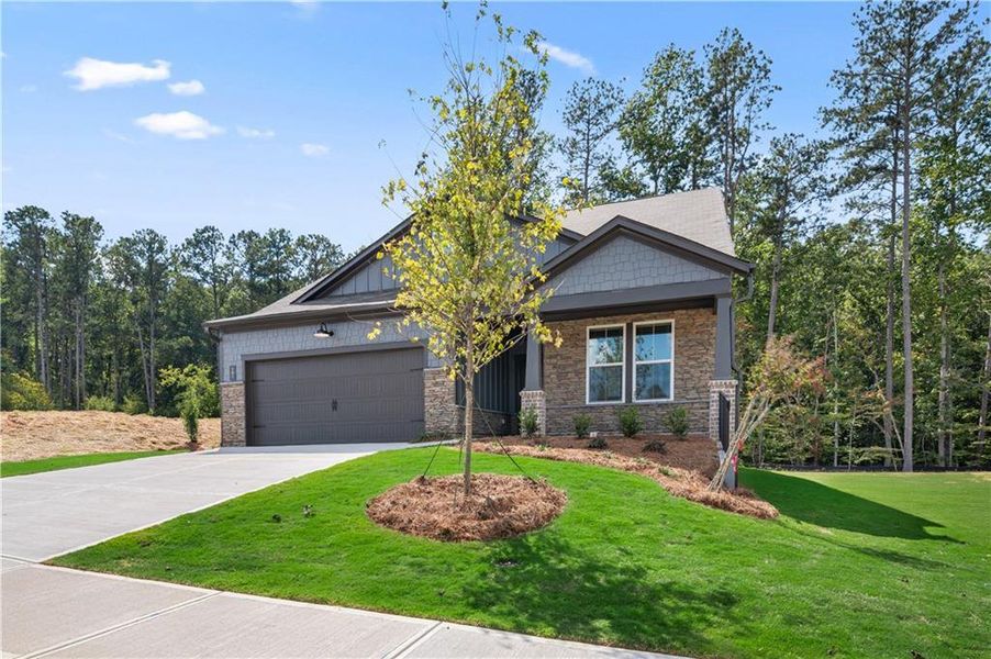 Front exterior of a new home in Cambridge at Steels Bridge: Steels Bridge, Canton, GA, highlighting curb appeal (Image 19). Front exterior of a new home in Cambridge at Steels Bridge: Steels Bridge, Canton, GA, highlighting curb appeal (Image 19).