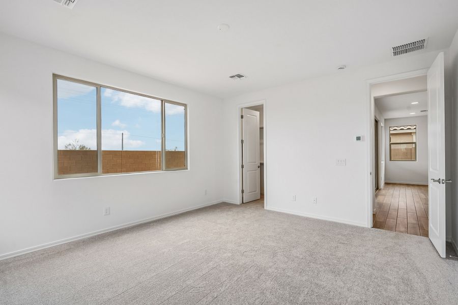 Spacious, unfurnished interior of a new home in Rancho Mercado, Surprise (Image 27).