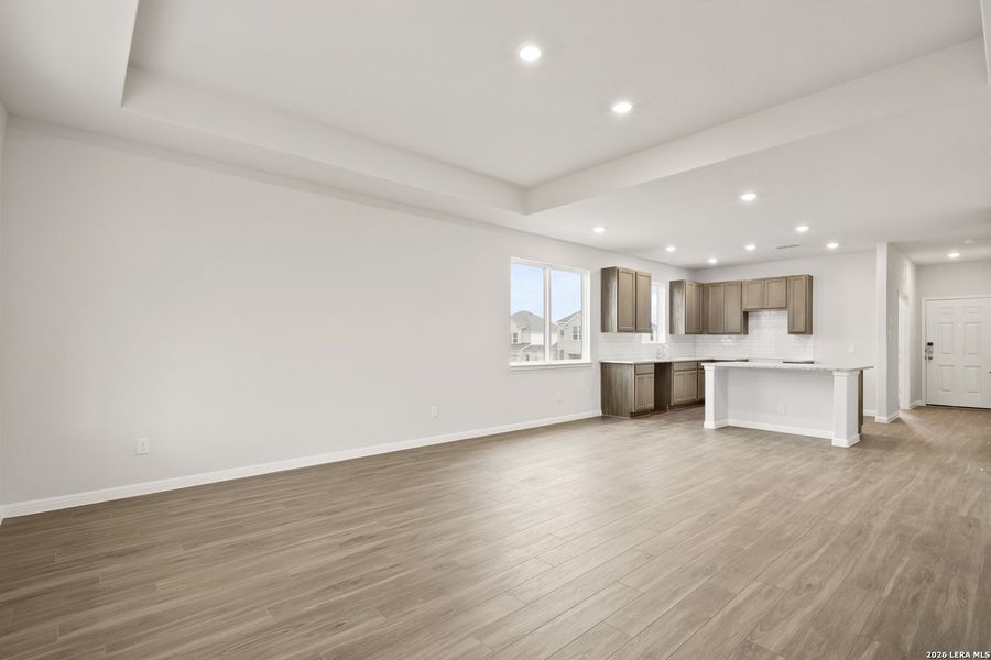 Spacious, unfurnished interior of a new home in Hunters Ranch, San Antonio (Image 25).