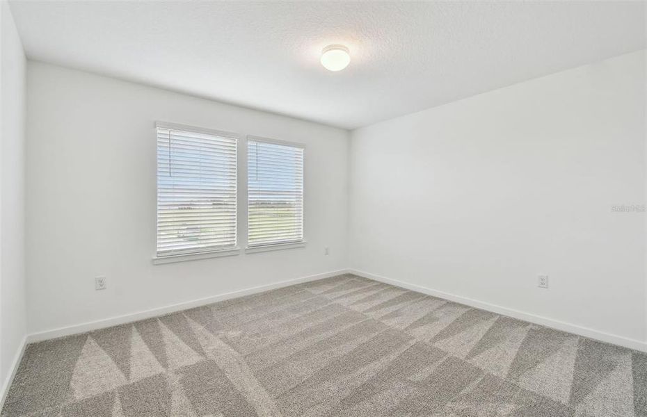 Spacious, unfurnished interior of a new home in Longmeadow at North River Ranch, Parrish (Image 22).