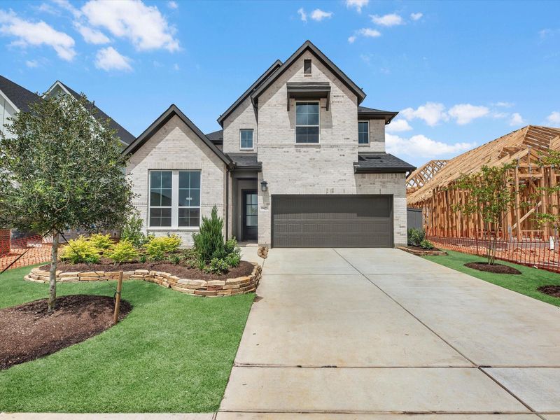 Front exterior of a new home in Jubilee 50′, Hockley, TX, highlighting curb appeal (Image 1). Front exterior of a new home in Jubilee 50′, Hockley, TX, highlighting curb appeal (Image 1).
