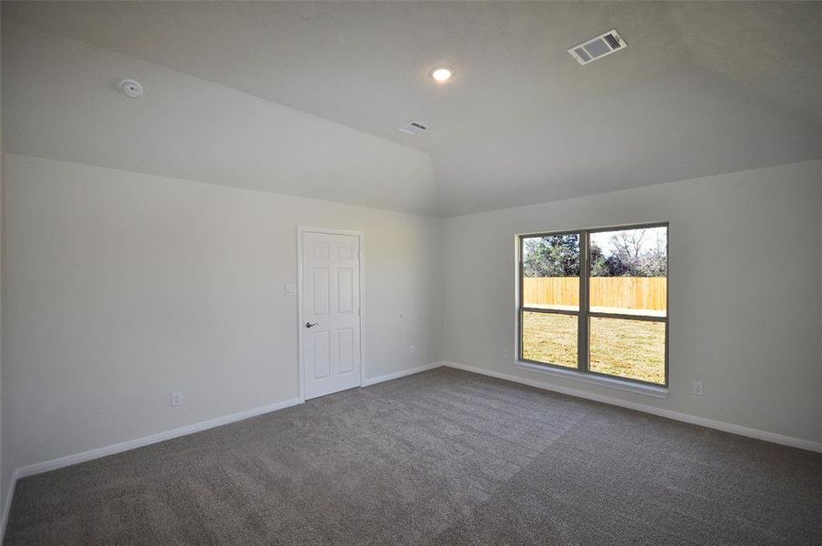 Master Bedroom is located privately to the rear of the home and separate from the seco9ndary bedrooms.