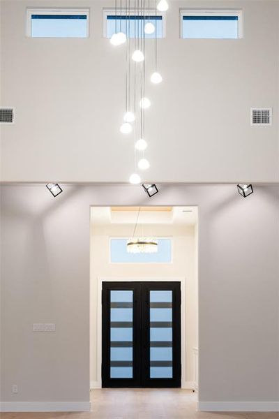 Entryway with baseboards and plenty of natural light Entryway with baseboards and plenty of natural light