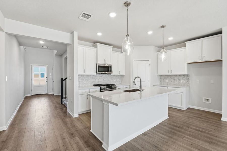 Furnished interior view inside a new home in Lisso, Pflugerville (Image 7).