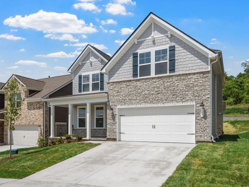 Front exterior of a new home in Woods Crossing, Gallatin, TN, highlighting curb appeal (Image 24).
