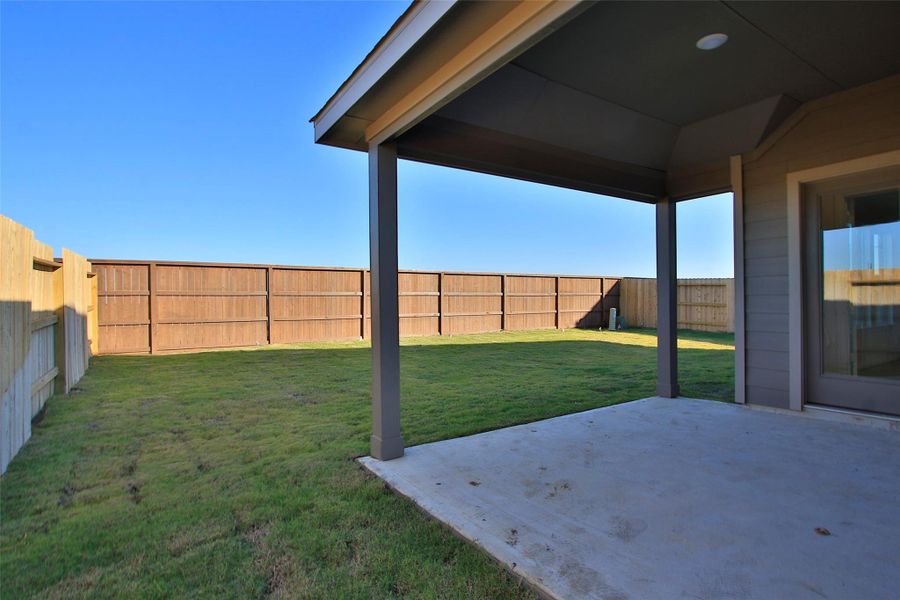 Exterior details and patio area of a home in Oakwood Estates, Waller (Image 19). Exterior details and patio area of a home in Oakwood Estates, Waller (Image 19).