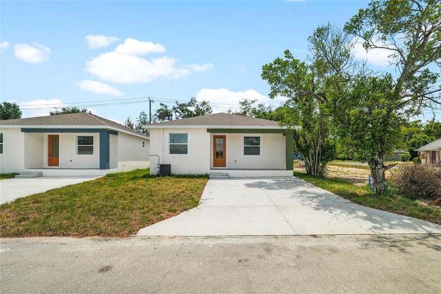 Front exterior of a new home in , Lakeland, FL, highlighting curb appeal (Image 22). Front exterior of a new home in , Lakeland, FL, highlighting curb appeal (Image 22).