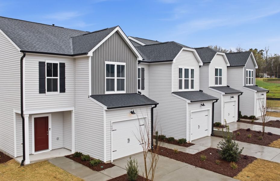 Front exterior of a new home in Flemingfield, Greensboro, NC, highlighting curb appeal (Image 30).