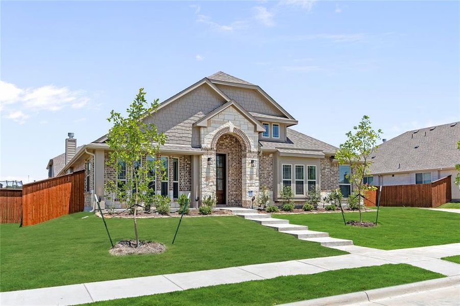 Front exterior of a new home in Hayes Crossing, Midlothian, TX, highlighting curb appeal (Image 19).